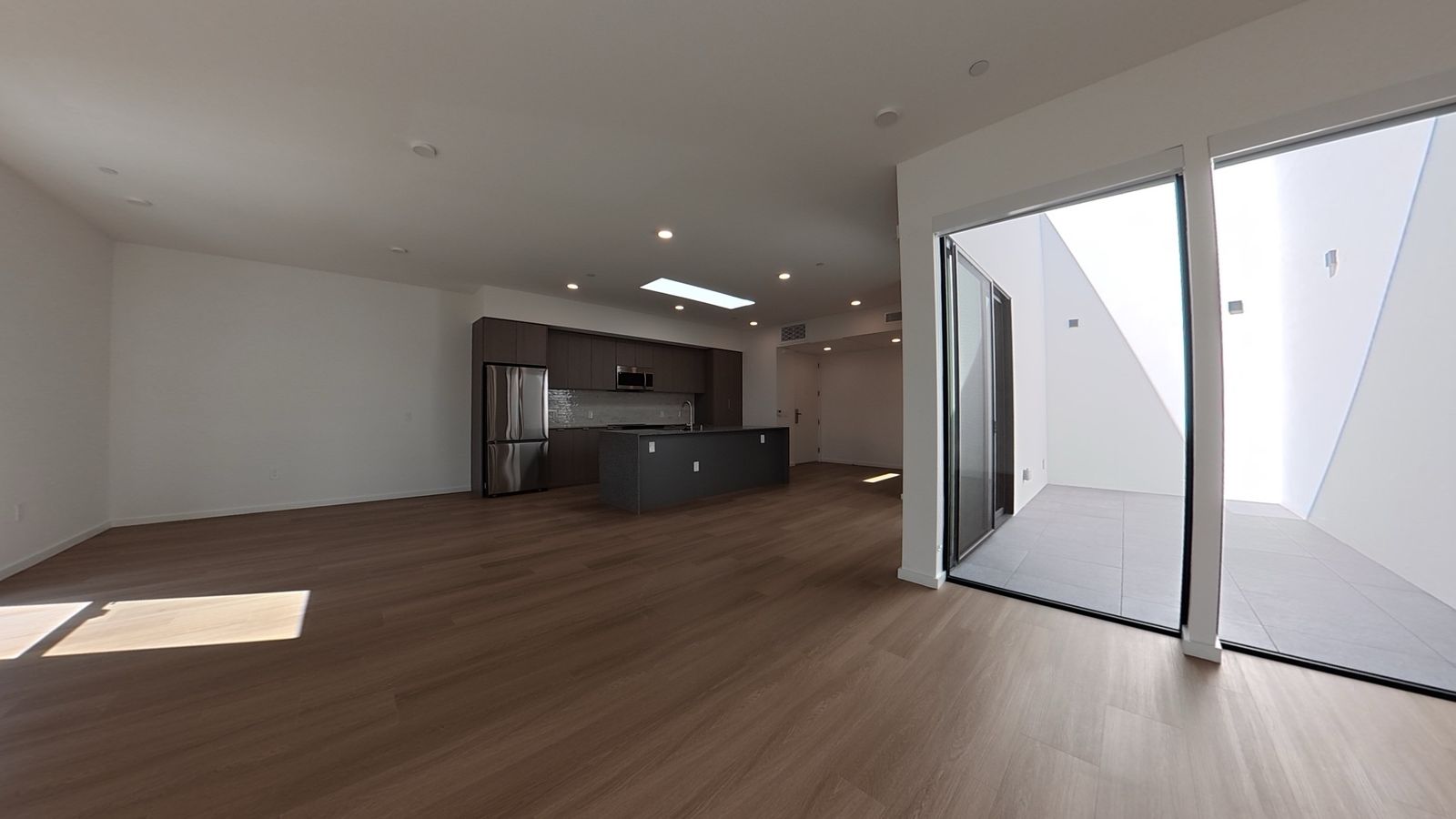 Living area with deck — residences photo, 5119 Colfax